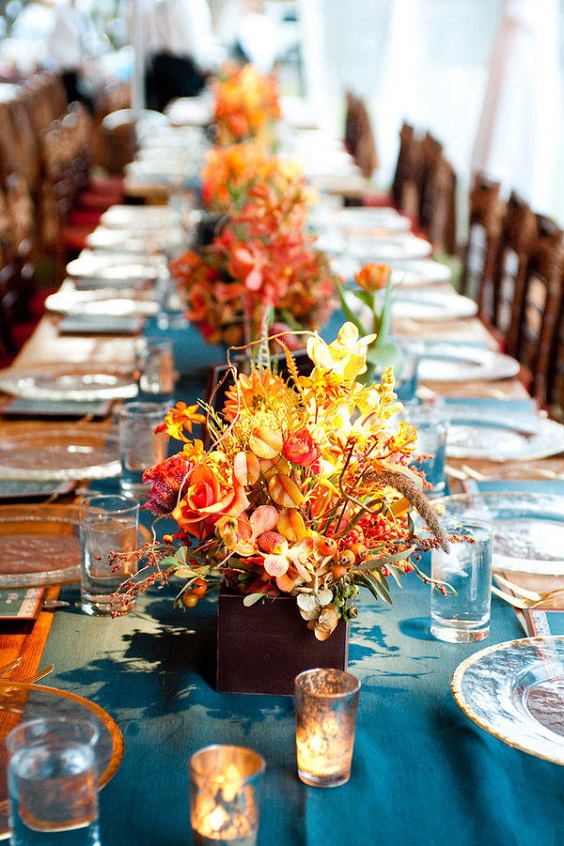teal table cloth orange centerpiece for teal orange rustic country wedding